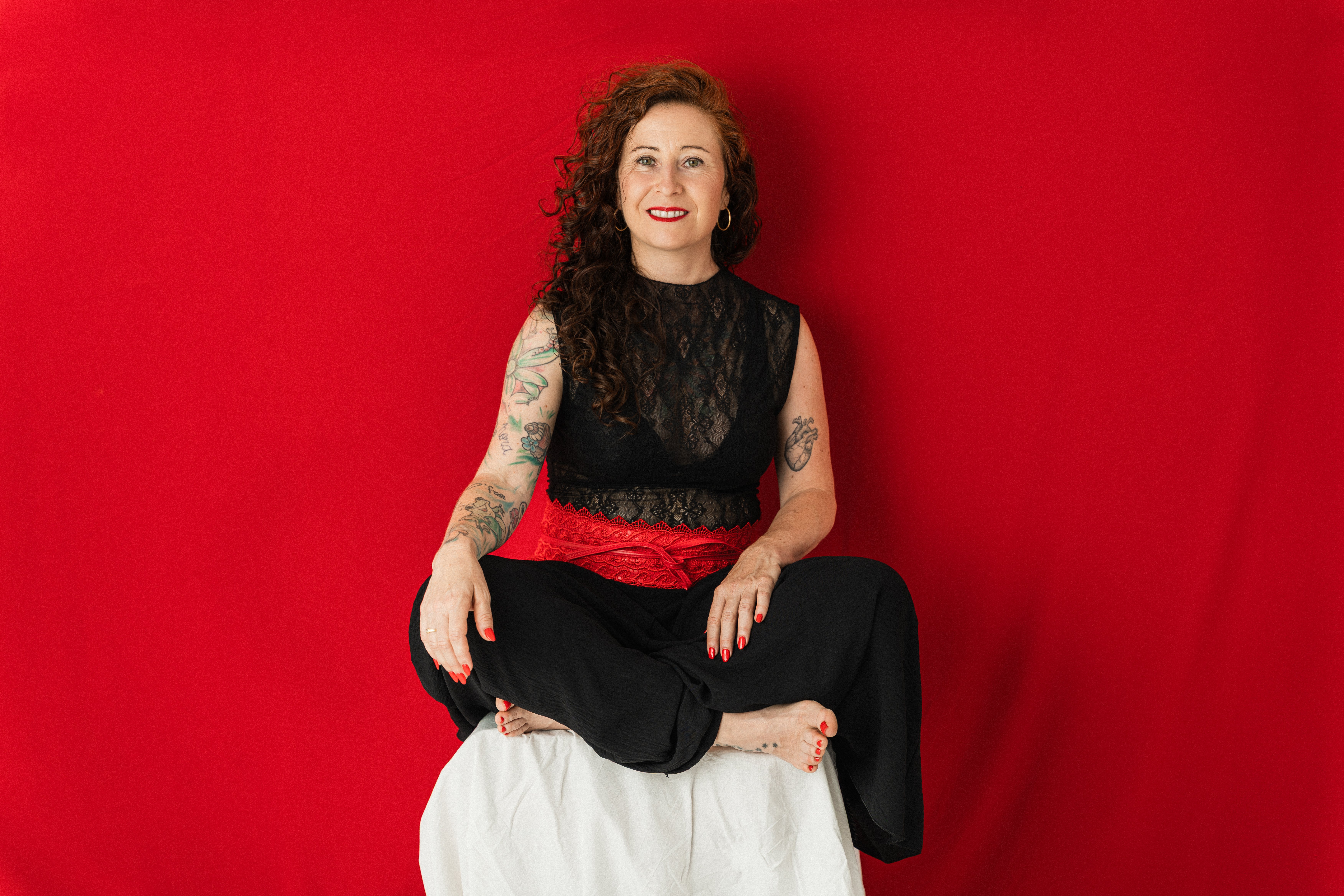 Marina seated in meditation pose